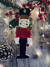 Load image into Gallery viewer, Nutcracker Ceramic Decoration with Bronze Lustre Detail
