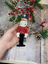 Load image into Gallery viewer, Nutcracker Ceramic Decoration with Bronze Lustre Detail
